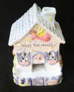 Thisis our brand new PORCELAIN ANGEL HOUSE CANDY DISH AND DISPENSER 