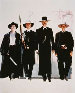 as Wyatt Earp, Val Kilmer as Doc Holliday, Sam Elliott as Virgil Earp 