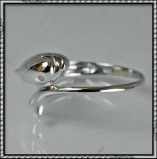 This is a 10K 0.02CT DOLPHIN design real round Diamond ring 