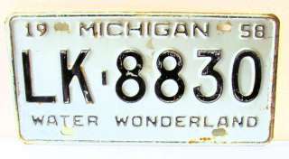   Black 1958 Michigan license plate #LK 8830 water wonderland  