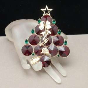 37) Large goldtone Christmas tree with big red and small green 