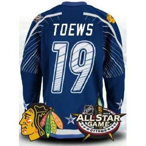   Jonathan Toews Hockey BLUE Jersey Size 48 (ALL are Sewn On) Sports