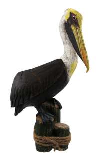 this beautiful cold cast resin pelican statue is finished to look like