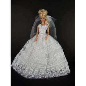  Very Delicate White Wedding Gown with Lace Accents on the 