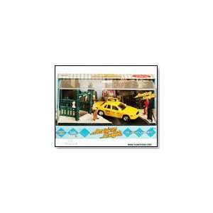   American Graffiti Moments in Time Die cast Yellow Taxi Toys & Games