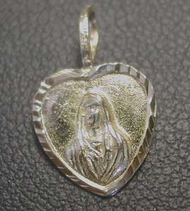 14K YELLOW GOLD IMMACULATE CONCEPTION IMAGE IN A HEART SHAPED MEDAL 