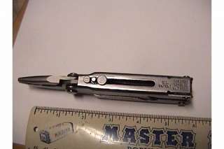 Vintage GERBER USA 9 multi tool with belt sheath, pat pend,  