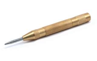   Center Punch Automatically Strikes Surface Without A Hammer  