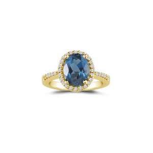  0.21 Cts Diamond & 0.81 Cts London Blue Topaz Ring in 18K 